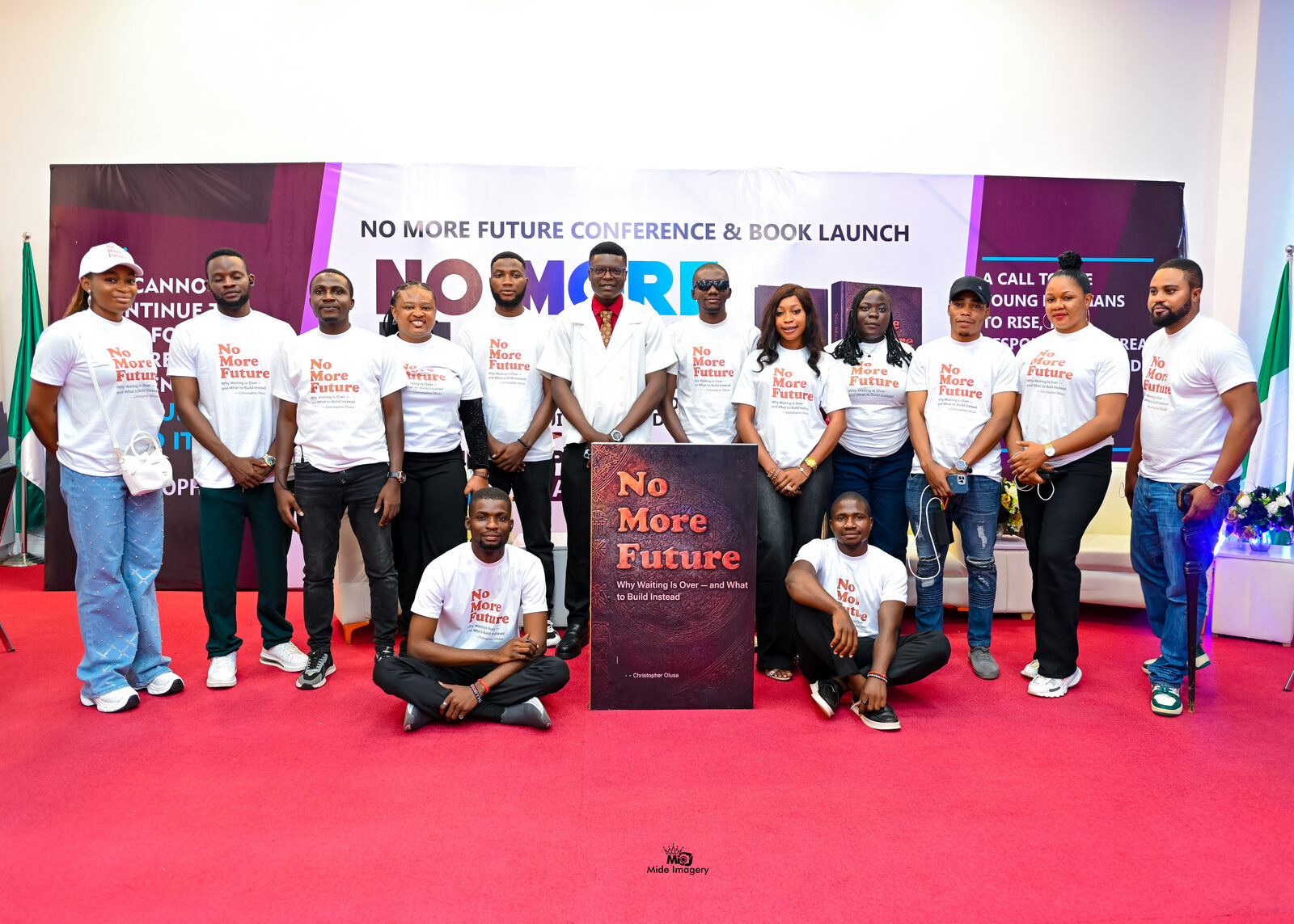 Christopher Olusa with the No More Future team at the conference
